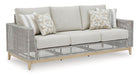 Seton Creek Outdoor Sofa with Cushion - Premium Outdoor Seating from Ashley Furniture - Just $1283.10! Shop now at Furniture Wholesale Plus  We are the best furniture store in Nashville, Hendersonville, Goodlettsville, Madison, Antioch, Mount Juliet, Lebanon, Gallatin, Springfield, Murfreesboro, Franklin, Brentwood