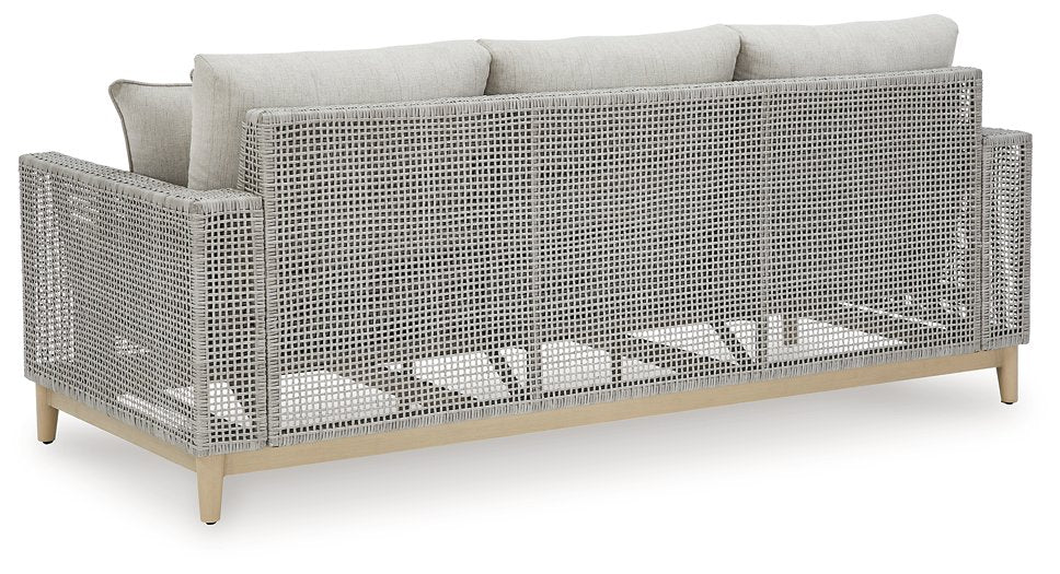 Seton Creek Outdoor Sofa with Cushion - Premium Outdoor Seating from Ashley Furniture - Just $1283.10! Shop now at Furniture Wholesale Plus  We are the best furniture store in Nashville, Hendersonville, Goodlettsville, Madison, Antioch, Mount Juliet, Lebanon, Gallatin, Springfield, Murfreesboro, Franklin, Brentwood