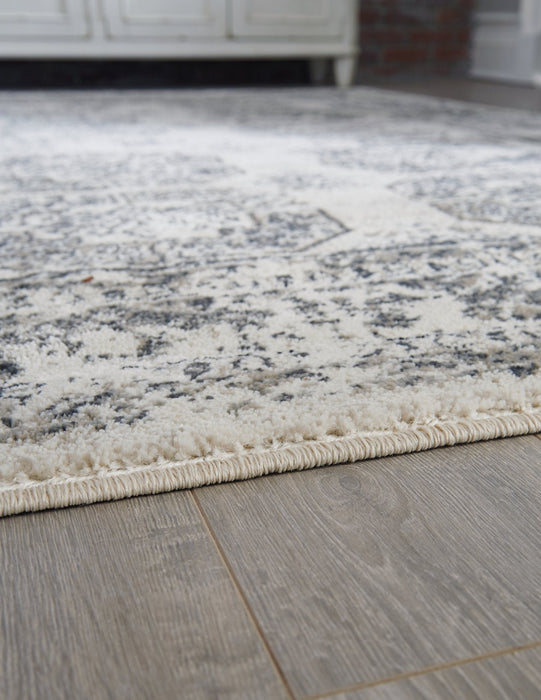 Jirou 5' x 7'6" Rug - Premium Rug from Ashley Furniture - Just $125.67! Shop now at Furniture Wholesale Plus  We are the best furniture store in Nashville, Hendersonville, Goodlettsville, Madison, Antioch, Mount Juliet, Lebanon, Gallatin, Springfield, Murfreesboro, Franklin, Brentwood