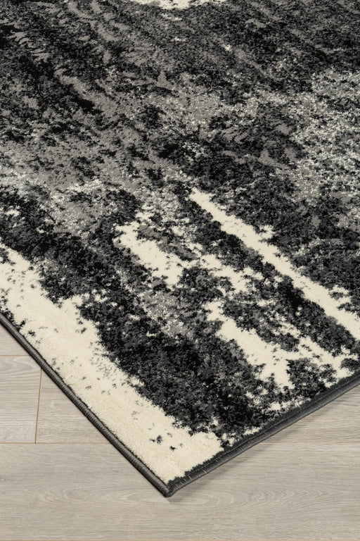 Roskos 5' x 7' Rug - Premium Rug from Ashley Furniture - Just $178.63! Shop now at Furniture Wholesale Plus  We are the best furniture store in Nashville, Hendersonville, Goodlettsville, Madison, Antioch, Mount Juliet, Lebanon, Gallatin, Springfield, Murfreesboro, Franklin, Brentwood