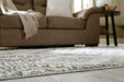 Monwick 7'10" x 10'3" Rug - Premium Rug from Ashley Furniture - Just $233.87! Shop now at Furniture Wholesale Plus  We are the best furniture store in Nashville, Hendersonville, Goodlettsville, Madison, Antioch, Mount Juliet, Lebanon, Gallatin, Springfield, Murfreesboro, Franklin, Brentwood
