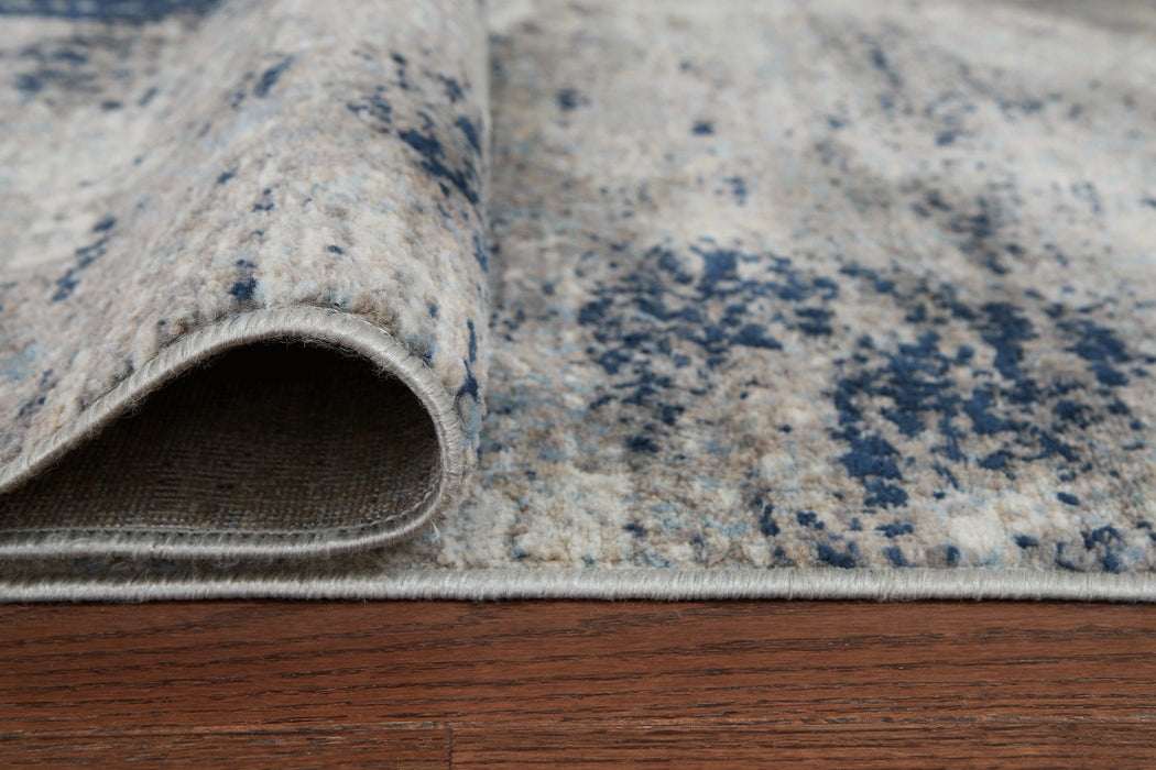 Wrenstow 7'10" x 10'3" Rug - Premium Rug from Ashley Furniture - Just $154.43! Shop now at Furniture Wholesale Plus  We are the best furniture store in Nashville, Hendersonville, Goodlettsville, Madison, Antioch, Mount Juliet, Lebanon, Gallatin, Springfield, Murfreesboro, Franklin, Brentwood