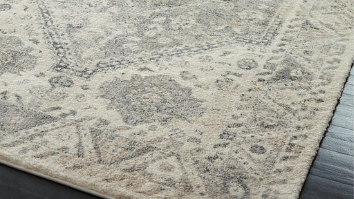 Precia 7'10" x 10'6" Rug - Premium Rug from Ashley Furniture - Just $445.72! Shop now at Furniture Wholesale Plus  We are the best furniture store in Nashville, Hendersonville, Goodlettsville, Madison, Antioch, Mount Juliet, Lebanon, Gallatin, Springfield, Murfreesboro, Franklin, Brentwood
