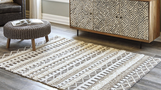 Karalee 5' x 7' Rug - Premium Rug from Ashley Furniture - Just $231.60! Shop now at Furniture Wholesale Plus  We are the best furniture store in Nashville, Hendersonville, Goodlettsville, Madison, Antioch, Mount Juliet, Lebanon, Gallatin, Springfield, Murfreesboro, Franklin, Brentwood