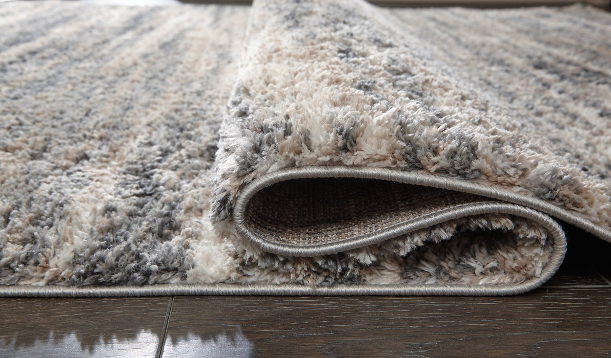 Gizela 7'10" x 10' Rug - Premium Rug from Ashley Furniture - Just $198.56! Shop now at Furniture Wholesale Plus  We are the best furniture store in Nashville, Hendersonville, Goodlettsville, Madison, Antioch, Mount Juliet, Lebanon, Gallatin, Springfield, Murfreesboro, Franklin, Brentwood