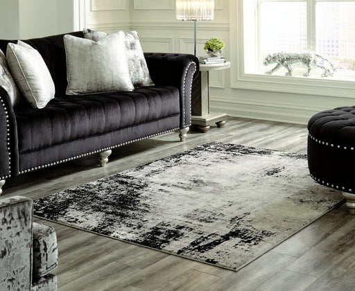 Zekeman 5'3" x 7'7" Rug - Premium Rug from Ashley Furniture - Just $125.67! Shop now at Furniture Wholesale Plus  We are the best furniture store in Nashville, Hendersonville, Goodlettsville, Madison, Antioch, Mount Juliet, Lebanon, Gallatin, Springfield, Murfreesboro, Franklin, Brentwood