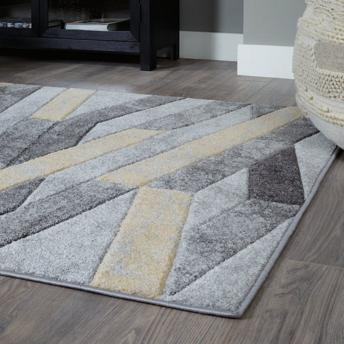 Wittson 7'5" x 9'6" Rug - Premium Rug from Ashley Furniture - Just $242.70! Shop now at Furniture Wholesale Plus  We are the best furniture store in Nashville, Hendersonville, Goodlettsville, Madison, Antioch, Mount Juliet, Lebanon, Gallatin, Springfield, Murfreesboro, Franklin, Brentwood