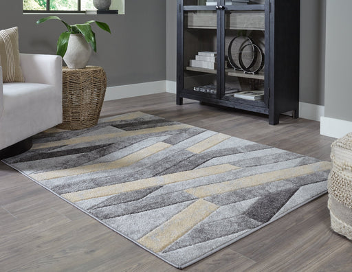 Wittson 5' x 7' Rug - Premium Rug from Ashley Furniture - Just $125.67! Shop now at Furniture Wholesale Plus  We are the best furniture store in Nashville, Hendersonville, Goodlettsville, Madison, Antioch, Mount Juliet, Lebanon, Gallatin, Springfield, Murfreesboro, Franklin, Brentwood