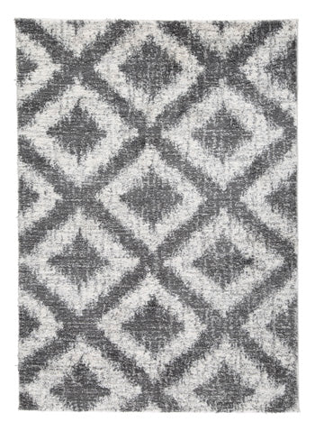 Junette 5'3" x 7'3" Rug - Premium Rug from Ashley Furniture - Just $99.19! Shop now at Furniture Wholesale Plus  We are the best furniture store in Nashville, Hendersonville, Goodlettsville, Madison, Antioch, Mount Juliet, Lebanon, Gallatin, Springfield, Murfreesboro, Franklin, Brentwood