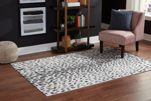 Samya 7'10" x 10'2" Rug - Premium Rug from Ashley Furniture - Just $145.60! Shop now at Furniture Wholesale Plus  We are the best furniture store in Nashville, Hendersonville, Goodlettsville, Madison, Antioch, Mount Juliet, Lebanon, Gallatin, Springfield, Murfreesboro, Franklin, Brentwood