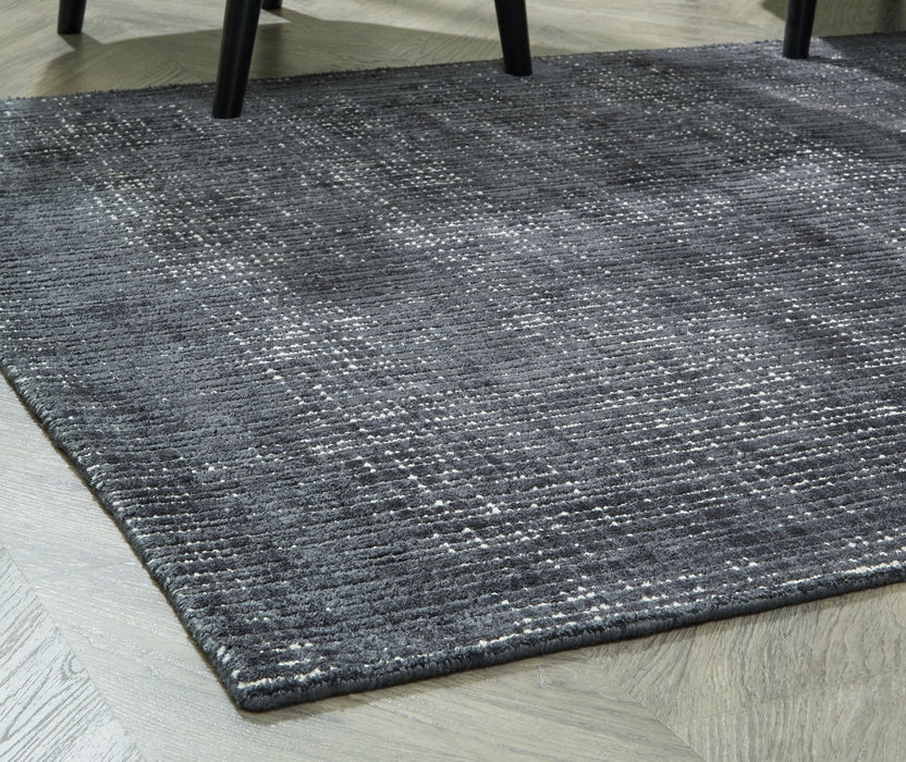Napier 5' x 7' Rug - Premium Rug from Ashley Furniture - Just $240.42! Shop now at Furniture Wholesale Plus  We are the best furniture store in Nashville, Hendersonville, Goodlettsville, Madison, Antioch, Mount Juliet, Lebanon, Gallatin, Springfield, Murfreesboro, Franklin, Brentwood