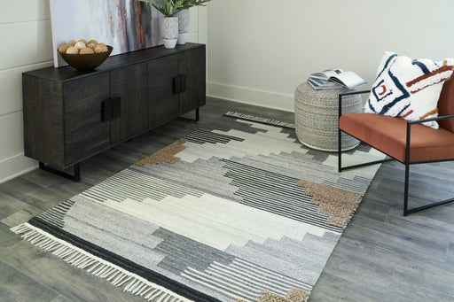 Roxsburg 5' x 7' Rug - Premium Rug from Ashley Furniture - Just $311.04! Shop now at Furniture Wholesale Plus  We are the best furniture store in Nashville, Hendersonville, Goodlettsville, Madison, Antioch, Mount Juliet, Lebanon, Gallatin, Springfield, Murfreesboro, Franklin, Brentwood