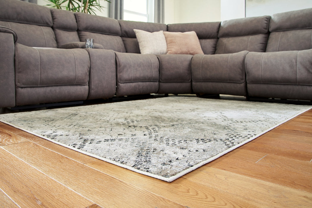 Poincilana 5' x 7' Rug - Premium Rug from Ashley Furniture - Just $187.46! Shop now at Furniture Wholesale Plus  We are the best furniture store in Nashville, Hendersonville, Goodlettsville, Madison, Antioch, Mount Juliet, Lebanon, Gallatin, Springfield, Murfreesboro, Franklin, Brentwood