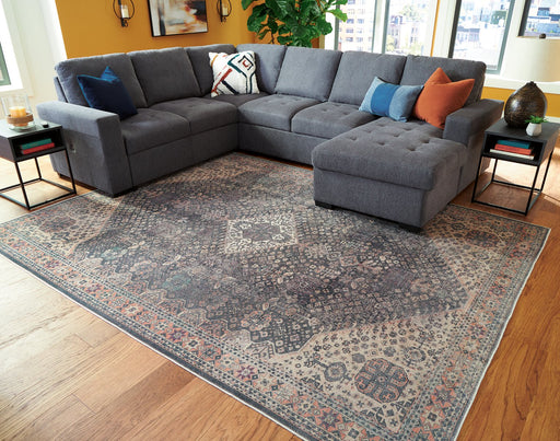 Rowner 7'7" x 10'1" Rug - Premium Rug from Ashley Furniture - Just $251.52! Shop now at Furniture Wholesale Plus  We are the best furniture store in Nashville, Hendersonville, Goodlettsville, Madison, Antioch, Mount Juliet, Lebanon, Gallatin, Springfield, Murfreesboro, Franklin, Brentwood