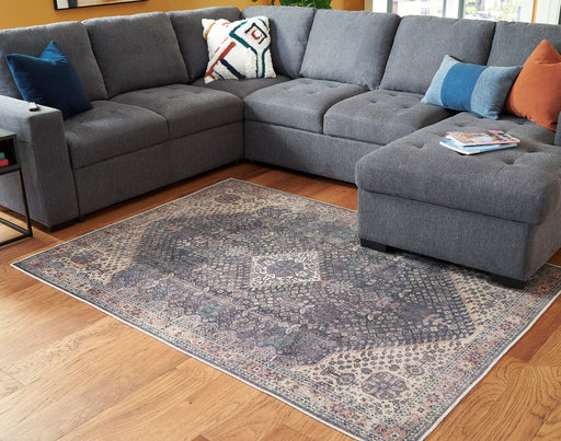 Rowner 5'2" x 7'1" Rug - Premium Rug from Ashley Furniture - Just $125.67! Shop now at Furniture Wholesale Plus  We are the best furniture store in Nashville, Hendersonville, Goodlettsville, Madison, Antioch, Mount Juliet, Lebanon, Gallatin, Springfield, Murfreesboro, Franklin, Brentwood