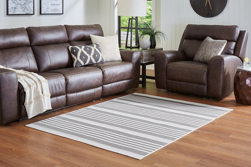 Reidman 7'10" x 9'10" Rug - Premium Rug from Ashley Furniture - Just $154.43! Shop now at Furniture Wholesale Plus  We are the best furniture store in Nashville, Hendersonville, Goodlettsville, Madison, Antioch, Mount Juliet, Lebanon, Gallatin, Springfield, Murfreesboro, Franklin, Brentwood
