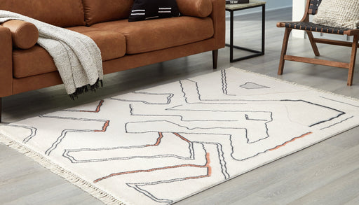 Cadeworth 7'5" x 10' Rug - Premium Rug from Ashley Furniture - Just $216.22! Shop now at Furniture Wholesale Plus  We are the best furniture store in Nashville, Hendersonville, Goodlettsville, Madison, Antioch, Mount Juliet, Lebanon, Gallatin, Springfield, Murfreesboro, Franklin, Brentwood