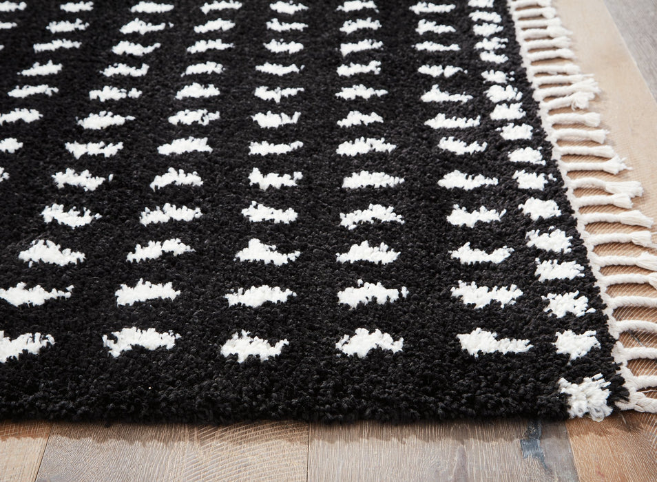 Minston 8' x 10' Rug - Premium Rug from Ashley Furniture - Just $251.52! Shop now at Furniture Wholesale Plus  We are the best furniture store in Nashville, Hendersonville, Goodlettsville, Madison, Antioch, Mount Juliet, Lebanon, Gallatin, Springfield, Murfreesboro, Franklin, Brentwood