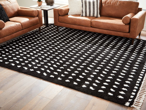 Minston 5' x 7' Rug - Premium Rug from Ashley Furniture - Just $125.67! Shop now at Furniture Wholesale Plus  We are the best furniture store in Nashville, Hendersonville, Goodlettsville, Madison, Antioch, Mount Juliet, Lebanon, Gallatin, Springfield, Murfreesboro, Franklin, Brentwood