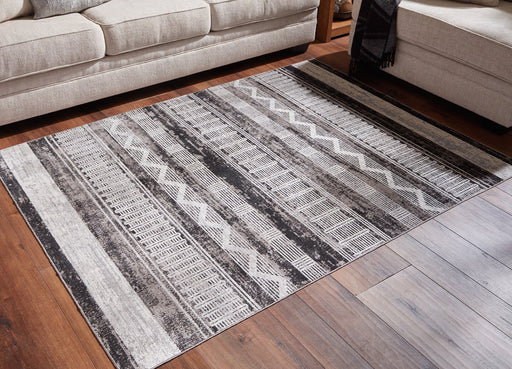 Henchester 8' x 10' Rug - Premium Rug from Ashley Furniture - Just $198.56! Shop now at Furniture Wholesale Plus  We are the best furniture store in Nashville, Hendersonville, Goodlettsville, Madison, Antioch, Mount Juliet, Lebanon, Gallatin, Springfield, Murfreesboro, Franklin, Brentwood