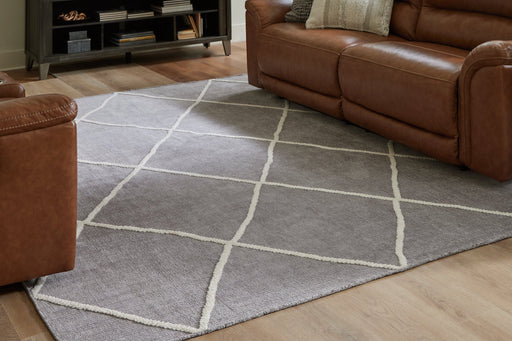 Stardo 7'10" x 10'1" Rug - Premium Rug from Ashley Furniture - Just $242.70! Shop now at Furniture Wholesale Plus  We are the best furniture store in Nashville, Hendersonville, Goodlettsville, Madison, Antioch, Mount Juliet, Lebanon, Gallatin, Springfield, Murfreesboro, Franklin, Brentwood
