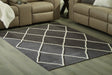 Stardo 4'11" x 7'2" Rug - Premium Rug from Ashley Furniture - Just $116.84! Shop now at Furniture Wholesale Plus  We are the best furniture store in Nashville, Hendersonville, Goodlettsville, Madison, Antioch, Mount Juliet, Lebanon, Gallatin, Springfield, Murfreesboro, Franklin, Brentwood