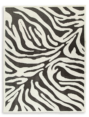 Thomwith 7'10" x 10'1" Rug - Premium Rug from Ashley Furniture - Just $242.70! Shop now at Furniture Wholesale Plus  We are the best furniture store in Nashville, Hendersonville, Goodlettsville, Madison, Antioch, Mount Juliet, Lebanon, Gallatin, Springfield, Murfreesboro, Franklin, Brentwood