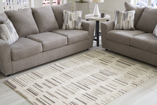 Leesdale 5' x 7' Rug - Premium Rug from Ashley Furniture - Just $134.50! Shop now at Furniture Wholesale Plus  We are the best furniture store in Nashville, Hendersonville, Goodlettsville, Madison, Antioch, Mount Juliet, Lebanon, Gallatin, Springfield, Murfreesboro, Franklin, Brentwood