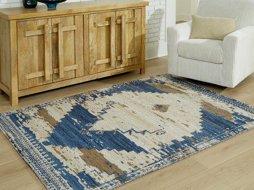 Varnler Rug - Premium Rug from Ashley Furniture - Just $152.15! Shop now at Furniture Wholesale Plus  We are the best furniture store in Nashville, Hendersonville, Goodlettsville, Madison, Antioch, Mount Juliet, Lebanon, Gallatin, Springfield, Murfreesboro, Franklin, Brentwood