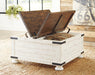 Wystfield Coffee Table - Premium Cocktail Table from Ashley Furniture - Just $378.01! Shop now at Furniture Wholesale Plus  We are the best furniture store in Nashville, Hendersonville, Goodlettsville, Madison, Antioch, Mount Juliet, Lebanon, Gallatin, Springfield, Murfreesboro, Franklin, Brentwood