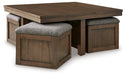 Boardernest Coffee Table with 4 Stools - Premium Cocktail Table from Ashley Furniture - Just $410.68! Shop now at Furniture Wholesale Plus  We are the best furniture store in Nashville, Hendersonville, Goodlettsville, Madison, Antioch, Mount Juliet, Lebanon, Gallatin, Springfield, Murfreesboro, Franklin, Brentwood