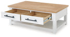 Ashbryn Coffee Table - Premium Cocktail Table from Ashley Furniture - Just $289.74! Shop now at Furniture Wholesale Plus  We are the best furniture store in Nashville, Hendersonville, Goodlettsville, Madison, Antioch, Mount Juliet, Lebanon, Gallatin, Springfield, Murfreesboro, Franklin, Brentwood