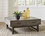 Mondoro Coffee Table with Lift Top - Premium Cocktail Table Lift from Ashley Furniture - Just $501.59! Shop now at Furniture Wholesale Plus  We are the best furniture store in Nashville, Hendersonville, Goodlettsville, Madison, Antioch, Mount Juliet, Lebanon, Gallatin, Springfield, Murfreesboro, Franklin, Brentwood