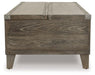 Chazney Coffee Table with Lift Top - Premium Cocktail Table Lift from Ashley Furniture - Just $501.59! Shop now at Furniture Wholesale Plus  We are the best furniture store in Nashville, Hendersonville, Goodlettsville, Madison, Antioch, Mount Juliet, Lebanon, Gallatin, Springfield, Murfreesboro, Franklin, Brentwood