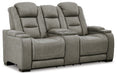 The Man-Den Power Reclining Loveseat with Console - Premium Loveseat from Ashley Furniture - Just $2091.18! Shop now at Furniture Wholesale Plus  We are the best furniture store in Nashville, Hendersonville, Goodlettsville, Madison, Antioch, Mount Juliet, Lebanon, Gallatin, Springfield, Murfreesboro, Franklin, Brentwood