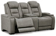 The Man-Den Power Reclining Loveseat with Console - Premium Loveseat from Ashley Furniture - Just $2091.18! Shop now at Furniture Wholesale Plus  We are the best furniture store in Nashville, Hendersonville, Goodlettsville, Madison, Antioch, Mount Juliet, Lebanon, Gallatin, Springfield, Murfreesboro, Franklin, Brentwood