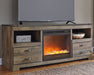 Trinell 63" TV Stand with Electric Fireplace - Premium TV Stand from Ashley Furniture - Just $591.28! Shop now at Furniture Wholesale Plus  We are the best furniture store in Nashville, Hendersonville, Goodlettsville, Madison, Antioch, Mount Juliet, Lebanon, Gallatin, Springfield, Murfreesboro, Franklin, Brentwood