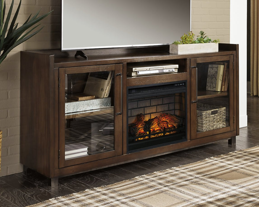 Starmore 70" TV Stand with Electric Fireplace - Premium Entertainment Center from Ashley Furniture - Just $915.06! Shop now at Furniture Wholesale Plus  We are the best furniture store in Nashville, Hendersonville, Goodlettsville, Madison, Antioch, Mount Juliet, Lebanon, Gallatin, Springfield, Murfreesboro, Franklin, Brentwood