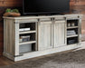 Carynhurst 70" TV Stand - Premium TV Stand from Ashley Furniture - Just $623.44! Shop now at Furniture Wholesale Plus  We are the best furniture store in Nashville, Hendersonville, Goodlettsville, Madison, Antioch, Mount Juliet, Lebanon, Gallatin, Springfield, Murfreesboro, Franklin, Brentwood