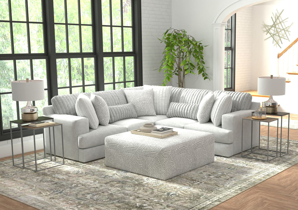 Logan - Upholstered Sectional With Comfort Coil Seating - 46" Cocktail Ottoman And Accent Pillows Included – 2 Piece Living Room Sets by Jackson at Furniture Wholesale Plus , Nashville furniture store
