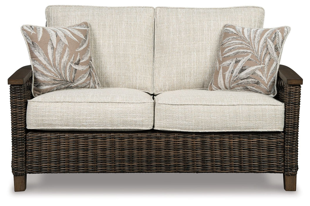 Paradise Trail - Medium Brown - Loveseat w/Cushion - Premium Loveseats from Signature Design by Ashley® - Just $1138! Shop now at Furniture Wholesale Plus  We are the best furniture store in Nashville, Hendersonville, Goodlettsville, Madison, Antioch, Mount Juliet, Lebanon, Gallatin, Springfield, Murfreesboro, Franklin, Brentwood