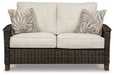 Paradise Trail - Medium Brown - Loveseat w/Cushion - Premium Loveseats from Signature Design by Ashley® - Just $1138! Shop now at Furniture Wholesale Plus  We are the best furniture store in Nashville, Hendersonville, Goodlettsville, Madison, Antioch, Mount Juliet, Lebanon, Gallatin, Springfield, Murfreesboro, Franklin, Brentwood