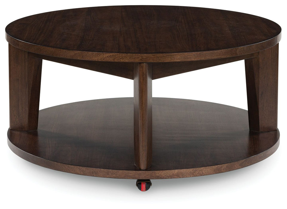 Korestone 2 - Round Cocktail Table - Dark Brown – Coffee Tables by Signature Design by Ashley® at Furniture Wholesale Plus , Nashville furniture store