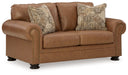 Carianna - Loveseat - Caramel – Stationary Loveseats by Signature Design by Ashley® at Furniture Wholesale Plus , Nashville furniture store