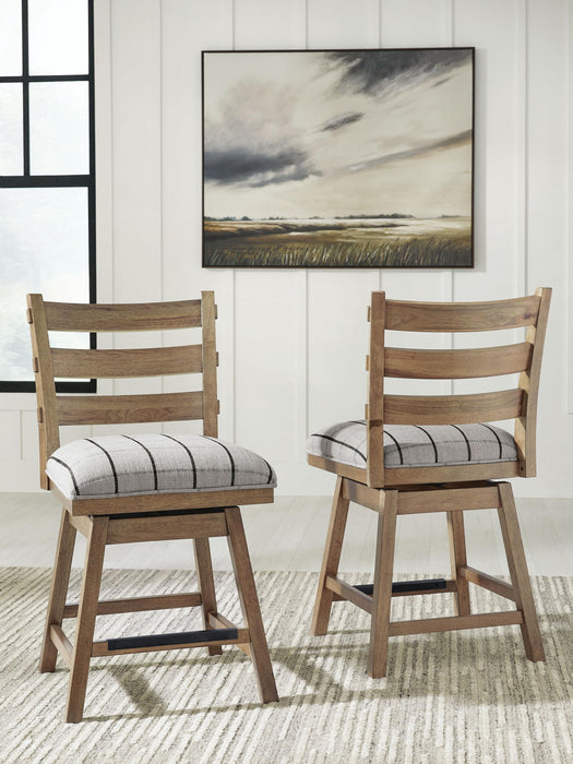 Ridgester - Upholstered Swivel Barstool (Set of 2) - Light Brown – Stool Sets by Benchcraft® at Furniture Wholesale Plus , Nashville furniture store
