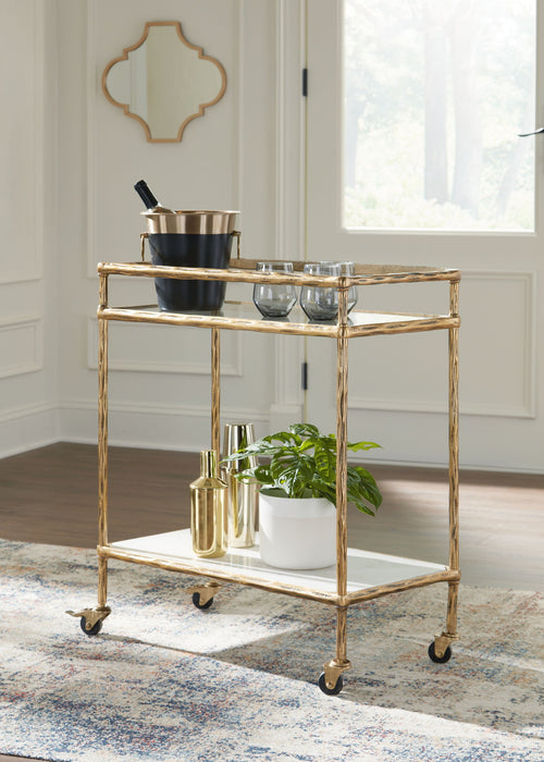 Plattfield - Antique Gold Finish - Bar Cart - Premium Bar Carts from Signature Design by Ashley® - Just $258! Shop now at Furniture Wholesale Plus  We are the best furniture store in Nashville, Hendersonville, Goodlettsville, Madison, Antioch, Mount Juliet, Lebanon, Gallatin, Springfield, Murfreesboro, Franklin, Brentwood