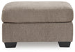 Loreo - Ottoman – Upholstered Ottomans by Benchcraft® at Furniture Wholesale Plus , Nashville furniture store