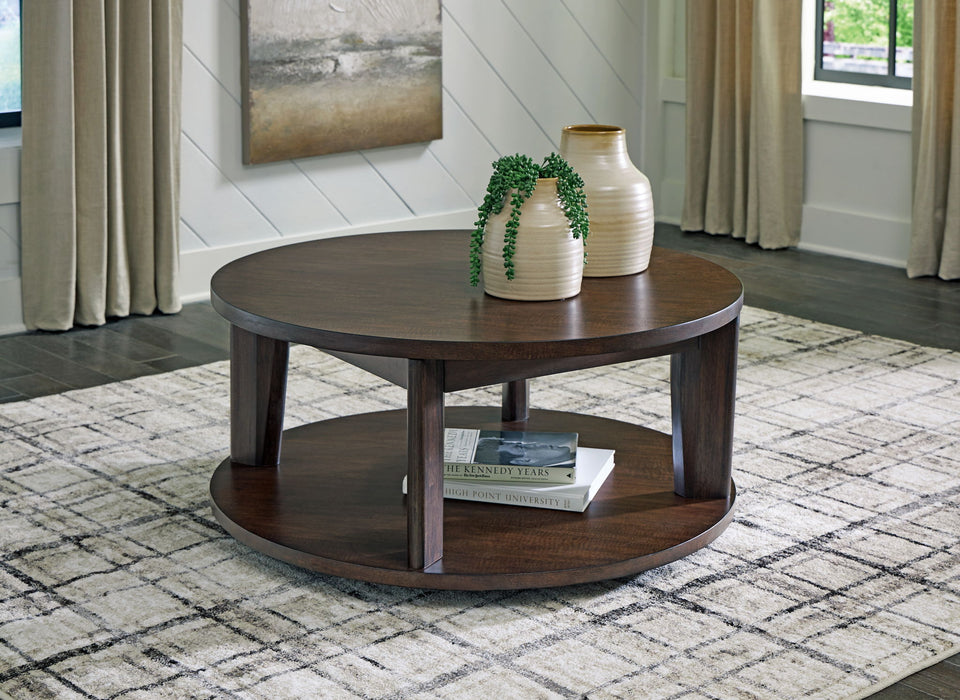 Korestone 2 - Round Cocktail Table - Dark Brown – Coffee Tables by Signature Design by Ashley® at Furniture Wholesale Plus , Nashville furniture store