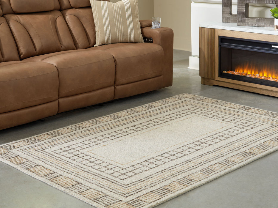 Idaman - Rug - Premium Area Rugs from Signature Design by Ashley® - Just $218! Shop now at Furniture Wholesale Plus  We are the best furniture store in Nashville, Hendersonville, Goodlettsville, Madison, Antioch, Mount Juliet, Lebanon, Gallatin, Springfield, Murfreesboro, Franklin, Brentwood