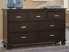 Covetown - Dresser - Dark Brown – Dressers by Signature Design by Ashley® at Furniture Wholesale Plus , Nashville furniture store